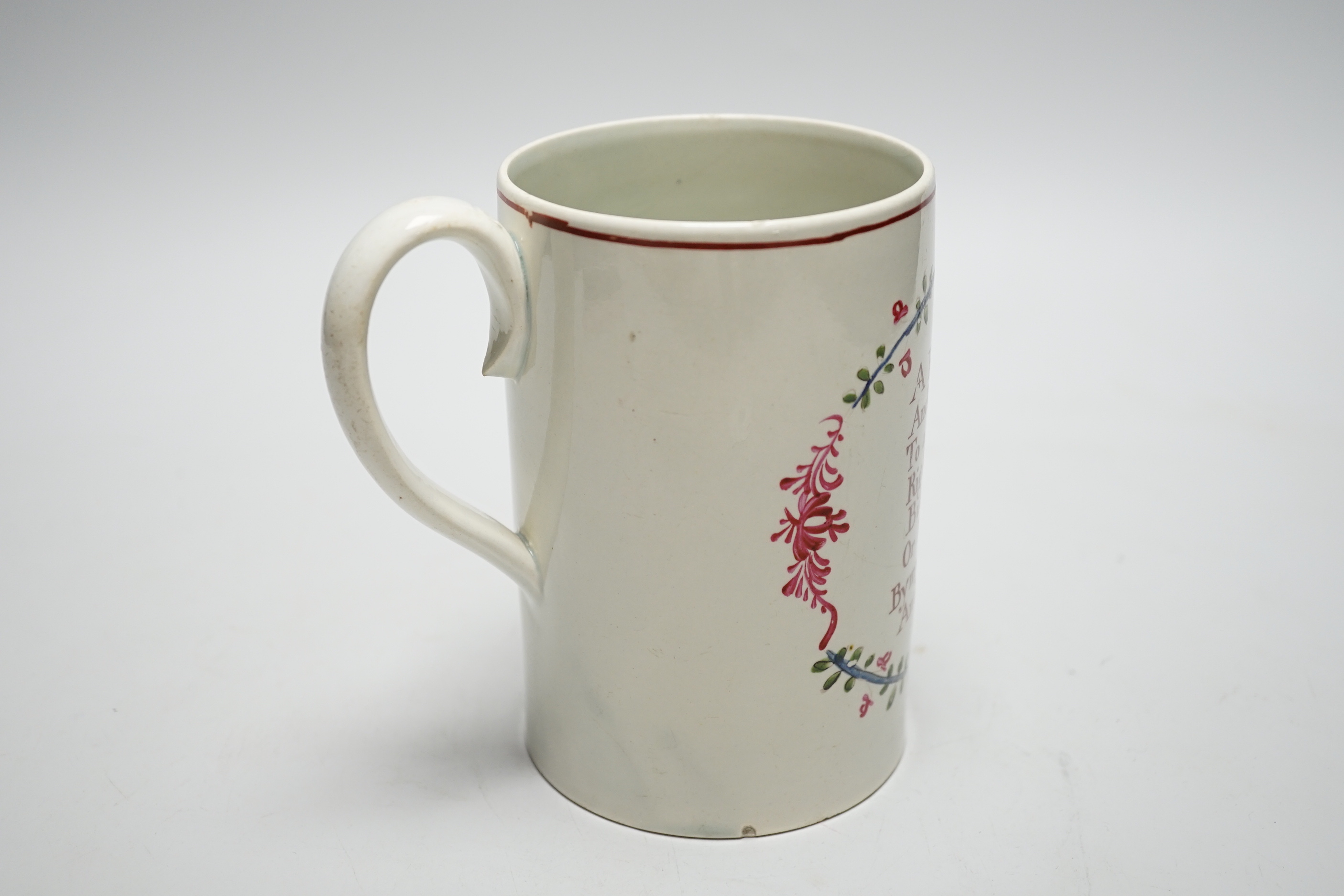 A pearlware mug printed with a verse, c.1790-1800, painted sprigs, 13cm